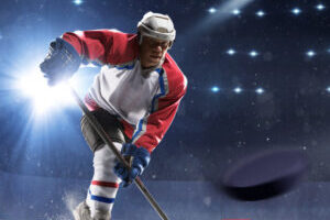 Ice hockey player on the ice arena